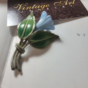 Unsigned Antique Tulip with center Pearl and Tulip is made of Hard Plastic